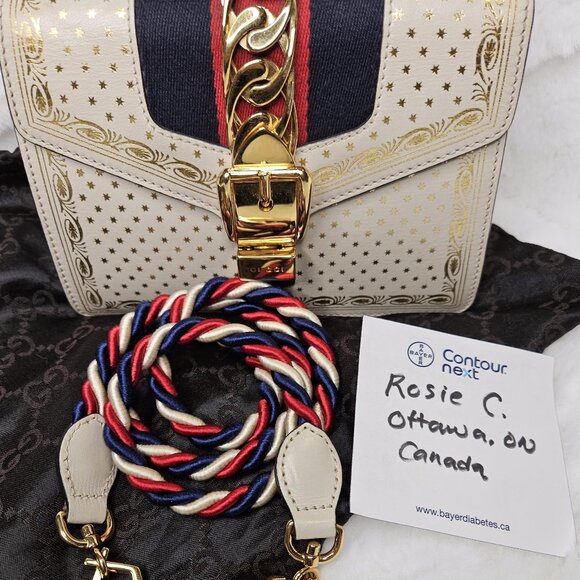 Authentic Gucci Sylvie Leather off White Colored Bag with Gold Star Print - Picture 1 of 17